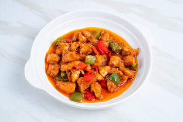 fried crispy chicken with sweet and sour sauce in Korean style. Perfect for recipe, article, catalogue, or any commercial purposes. With copy space