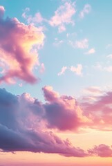 Fototapeta premium Beautiful pastel sky with fluffy clouds during sunset, vibrant colors of pink, orange, and blue creating a serene and calming atmosphere for relaxation
