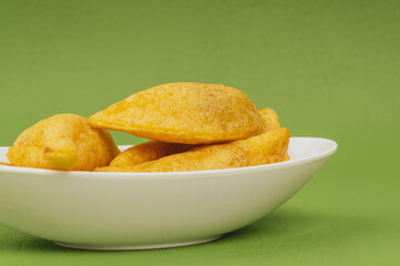 Colombian empanada with spicy sauce 