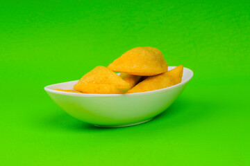 Delicious traditional Colombian empanadas with spicy sauce