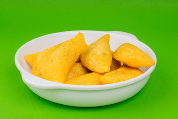 Colombian empanada with spicy sauce 