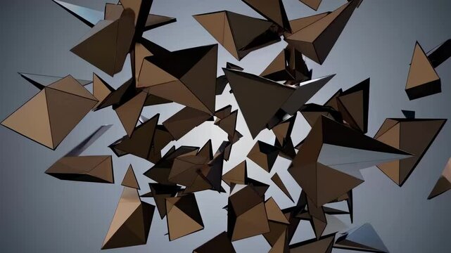 Dynamic video of geometric shards exploding outward, captured from a front-facing angle, showcasing a modern, abstract style with metallic hues.