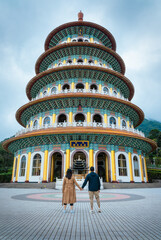 A couple visiting the Wuji Tianyuan Temple, A Majestic Marvel of Taiwan’s Spiritual and Architectural Beauty