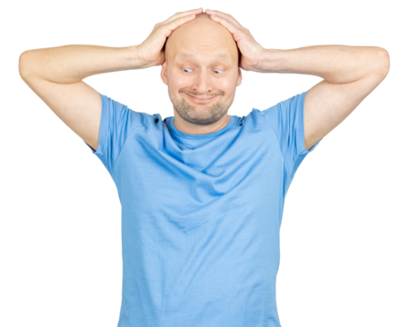 Confused man holding head with hands and making grimace on white background