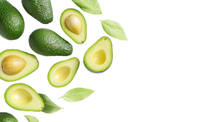 Fresh organic avocado halves with green leaves placed on a white table surface  Healthy and nutritious plant based food concept with copy space