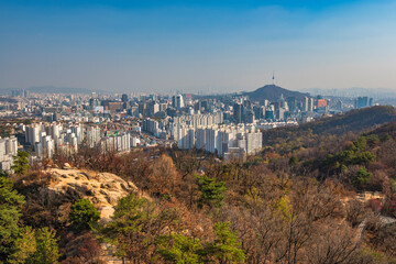 Seoul South Korea city skyline view from Ansan mountain peak in autumn