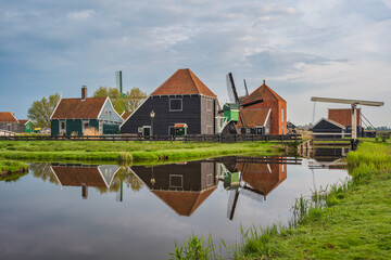 Dutch Windmill and traditional house at Zaanse Schans Village, Amsterdam Netherlands