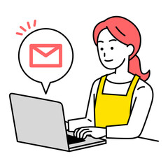ノートパソコンでメールを受信するエプロン姿の女性