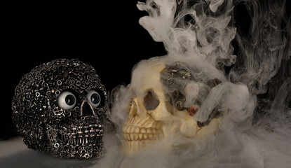Naklejka premium Skull made from bolts and cogs home made skull with cogs for brains dramatic day of dead statue made from silicon mould and hand painted by photographer