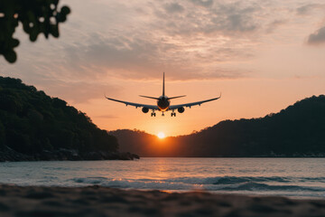 A plane is flying over a body of water with a beautiful sunset in the background