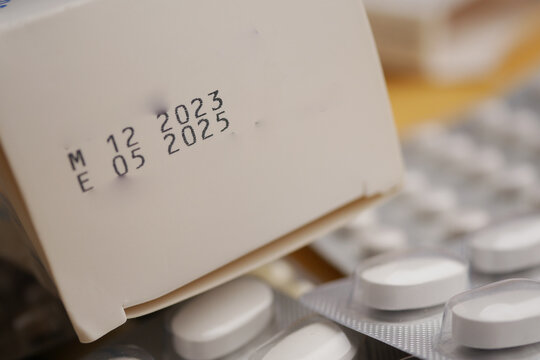 Expiration date on medication box captured in detailed close-up