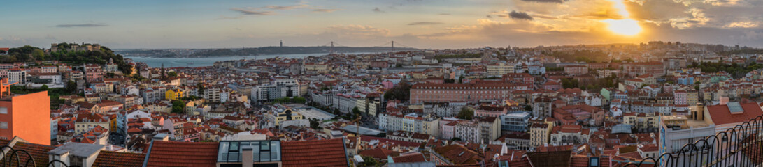 Fototapeta premium Lisbon Portugal, high angle view panorama sunset city skyline at Lisbon Baixa district with Lisbon Pantheon