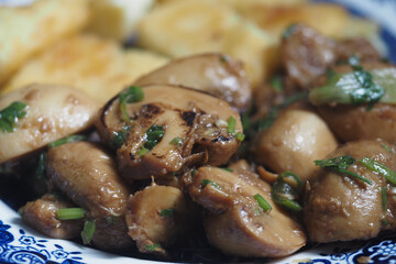 Delicious stir-fried mushrooms with herbs and side of plantains