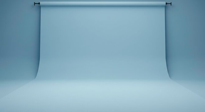 Studio Backdrop: An empty and seamless light blue backdrop provides a versatile and neutral space for photography, product shots, and creative projects.