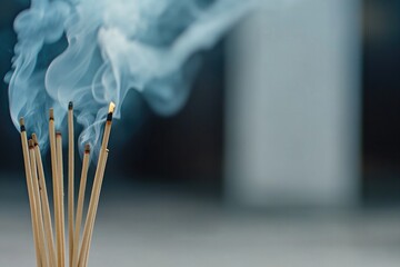 cinematic close-up of incense sticks burning in temple with smoke swirling gracefully in soft lighting