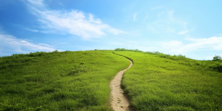 This serene image features a winding pathway leading up a lush green hill under a bright sky, symbolizing adventure and exploration in nature.