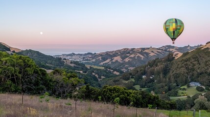 hot air balloon view decorated with hills and sunlight