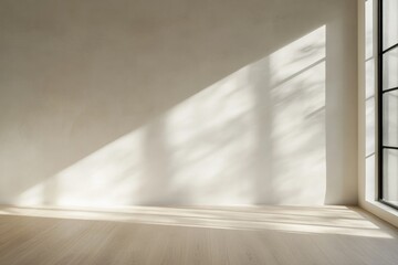 spacious minimalistic interior with empty wall in soft neutral tones bathed in natural light