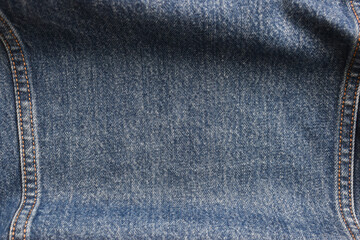 Fototapeta premium seam of blue denim texture background, jean fashion style