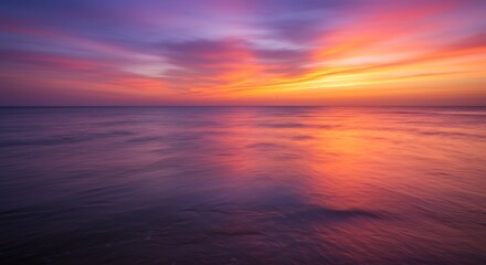 Vibrant sunset paints calming ocean hues. AI Generated
