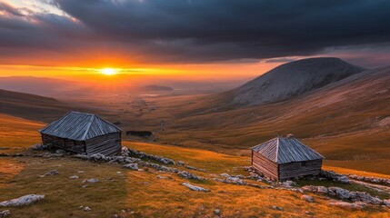 Obraz premium A stunning mountain scene captured at sunset with dramatic clouds and vibrant colors reflecting nature?s breathtaking beauty