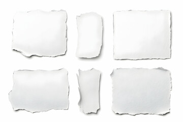 Abstract Torn White Paper Pieces Isolated On White Background Photo