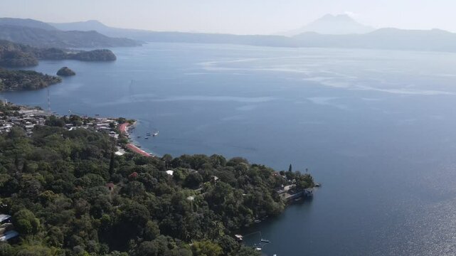 Views of the beautiful Ilopango Lake in El Salvador, with mountains and volcanoes around during the summer
