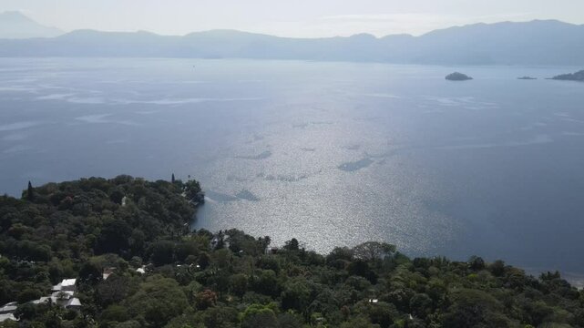 Views of the beautiful Ilopango Lake in El Salvador, with mountains