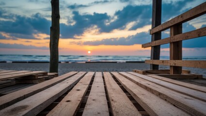 Obraz premium Wooden Slats Overlooking Beach at Sunset with Cloudy Evening Sky in Background