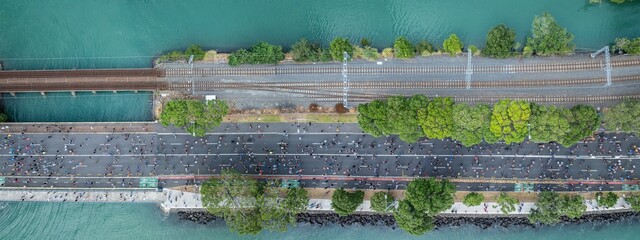 Aerial view of Round The Bays fun run. Runners cross a bridge over the water. Active lifestyle. PARNELL, AUCKLAND, NEW ZEALAND