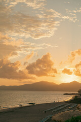 Sunset on the tourist beach of Playa Blanca on the island of Lanzarote in Spain.