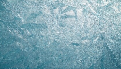 Obraz premium delicate frost patterns on icy glass surface with intricate crystalline texture, perfect for winter themed background