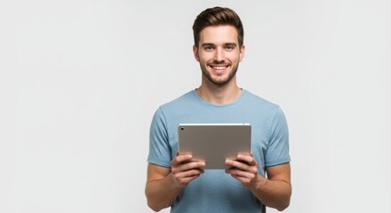 Happy man holding a tablet.