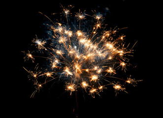 Spectacular firework display illuminates the night sky with dazzling vibrant patterns and colors