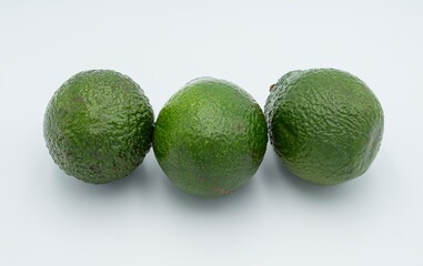 Fresh ripe green avocado on white background