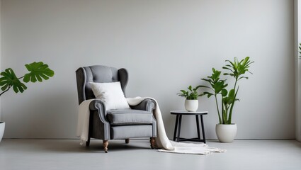 modern minimalist interior design ideas featuring a light wall backdrop, a vintage gray recliner with a white cushion and throw, a side table with a potted green plant, and no people present