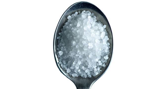 A metal spoon brimming with glistening sea salt crystals, reflecting soft light. --ar 16:9