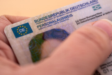 German identity card, document, concept obtaining German citizenship, migration law, passport control border, foreign travel, obtaining visa, Frankfurt - January, 29, 2025