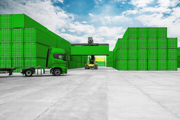 A blue truck is pulling a container off a stack of containers
