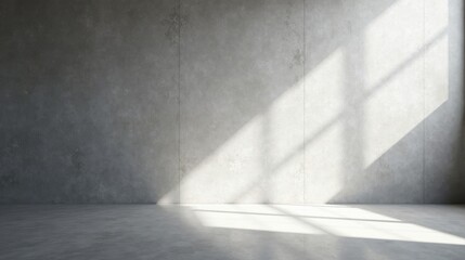 Empty Room with Concrete Wall and Sunlit Floor Showing Light and Shadow Patterns