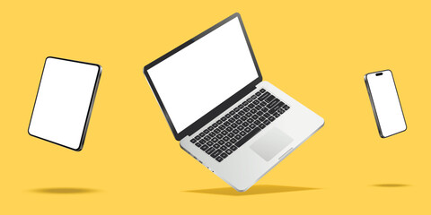 Laptop, smartphone and tablet while levitating in the air on a yellow background