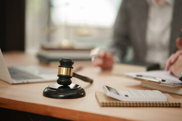 Asian female businesswoman lawyer sits and gives legal advice