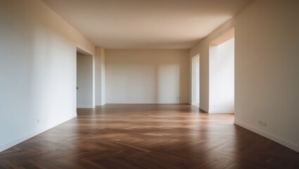 Vacant apartment interior featuring a spacious room with wooden flooring.