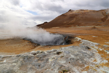 Mud springs and solfatars in the colorful high-temperature area of Namaskard-Iceland