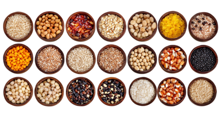 various dry grains and legumes in wooden bowls isolated on black
