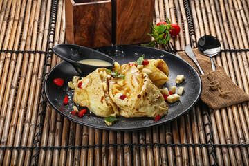 Sweet banana pancake with honey