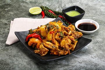 Vietnamese cuisine - fried frog with vegetables