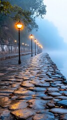 Misty dawn, cobblestone path, riverside lamps