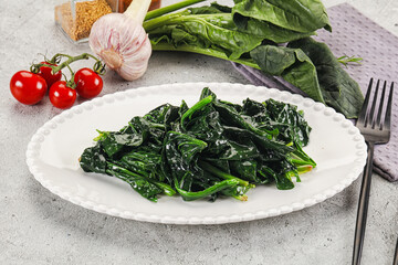 Coocked green spinach with oil