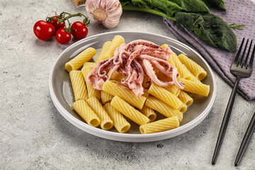 Italian cuisine - pasta tortiglioni with squid